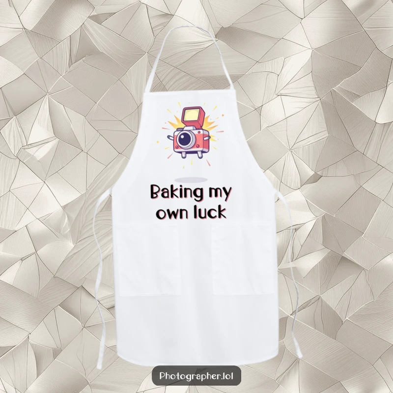 Funny apron featuring a cute icon leaping excitedly with a camera flash exploding, adding a creative touch to kitchen or studio wear.