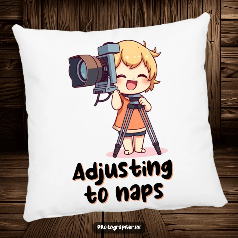 Funny pillow showing a character giggling while adjusting a large vintage camera tripod, a humorous home decor piece.