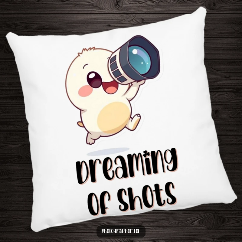 Funny pillow featuring a small, round creature in a happy leap, holding a large camera, perfect for adding whimsical charm.