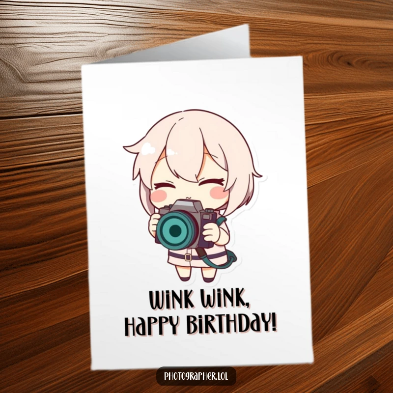 Funny free printable birthday card with a smiling character winking and adjusting a camera strap.