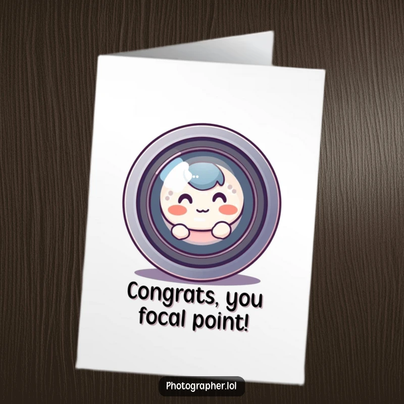 Funny free printable congratulations card: a round character blushingly peeks from behind a large camera lens, sending sweet congrats.