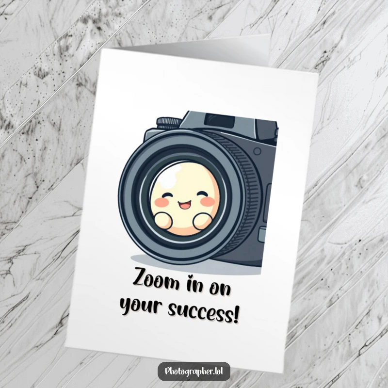 Funny free printable congratulations card showing a cute blob character giggling through a vintage camera lens.