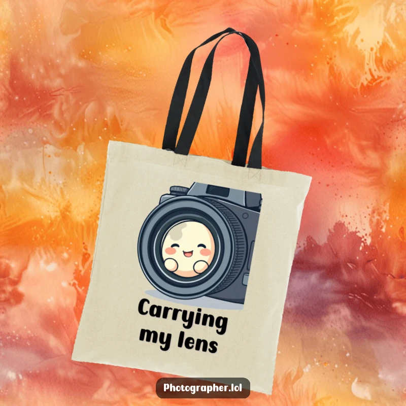 Funny tote bag showing a cute blob character giggling as it peers through a vintage camera lens, embodying playful photographic curiosity.
