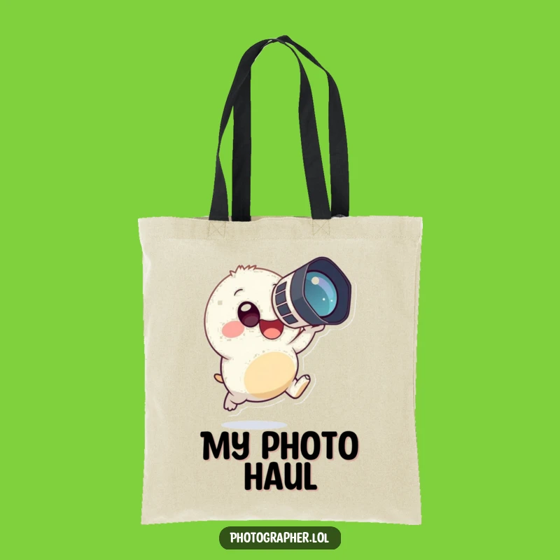 Carry your gear and your sense of humor with this funny tote bag. Features a tiny, round creature leaping with a camera.