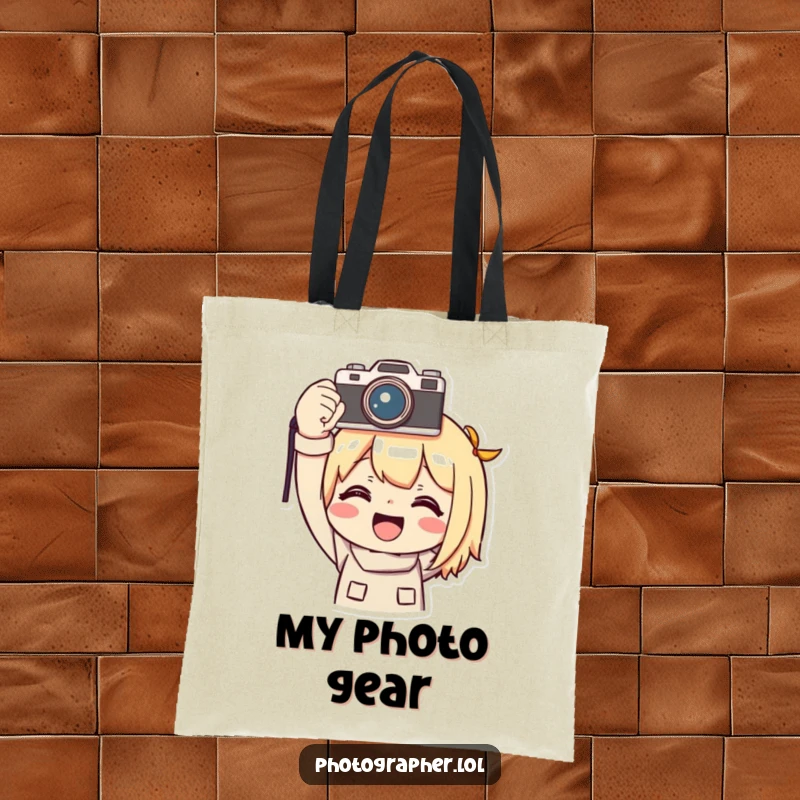 Funny photographer tote bag featuring a character smiling triumphantly while holding a camera overhead, perfect for carrying gear.