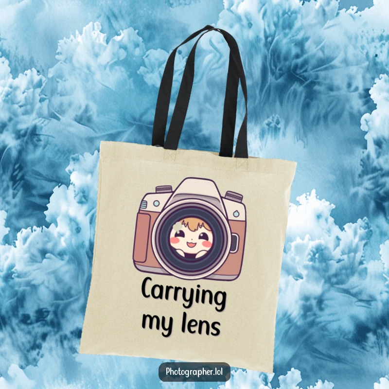 Funny shy photographer tote bag with a small character peeking from behind a camera lens, a humorous and practical accessory.