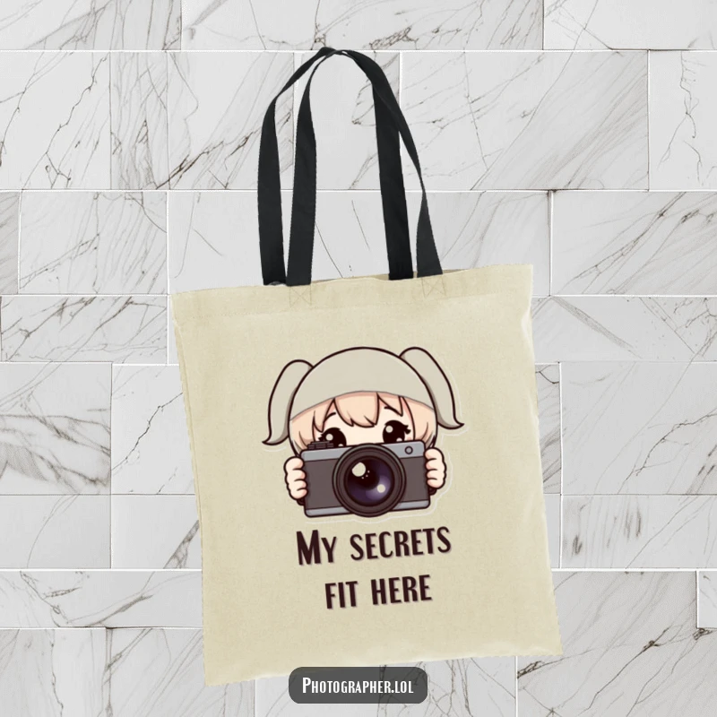 Funny tote bag featuring a character peeking shyly from behind a camera, perfect for carrying photography gear or daily essentials.